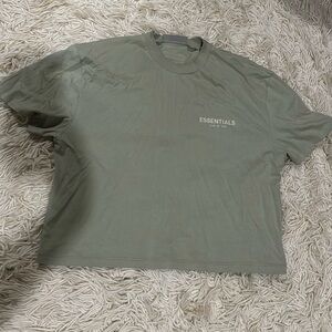 Green fear of god essentials shirt